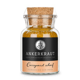 Scharfes Currywurst Gewürz von Ankerkraut im Korkenglas auf weißem Hintergrund.